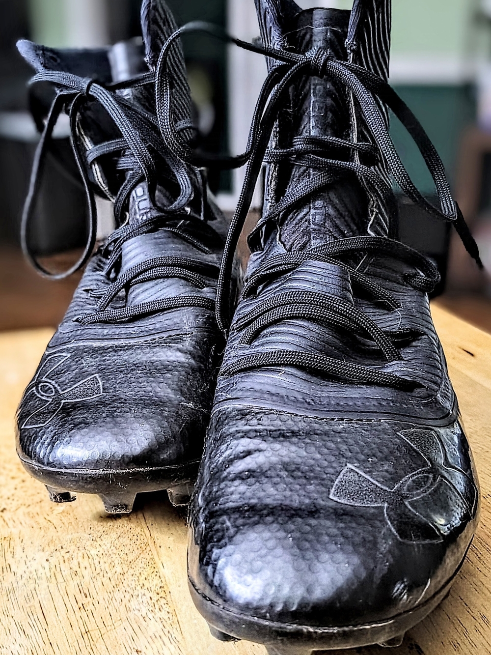 Under Armour Men’s Black High-Top Athletic Cleats with Laces